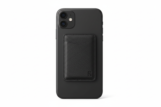 MagSafe wallet card holder attached to back of iPhone in black
